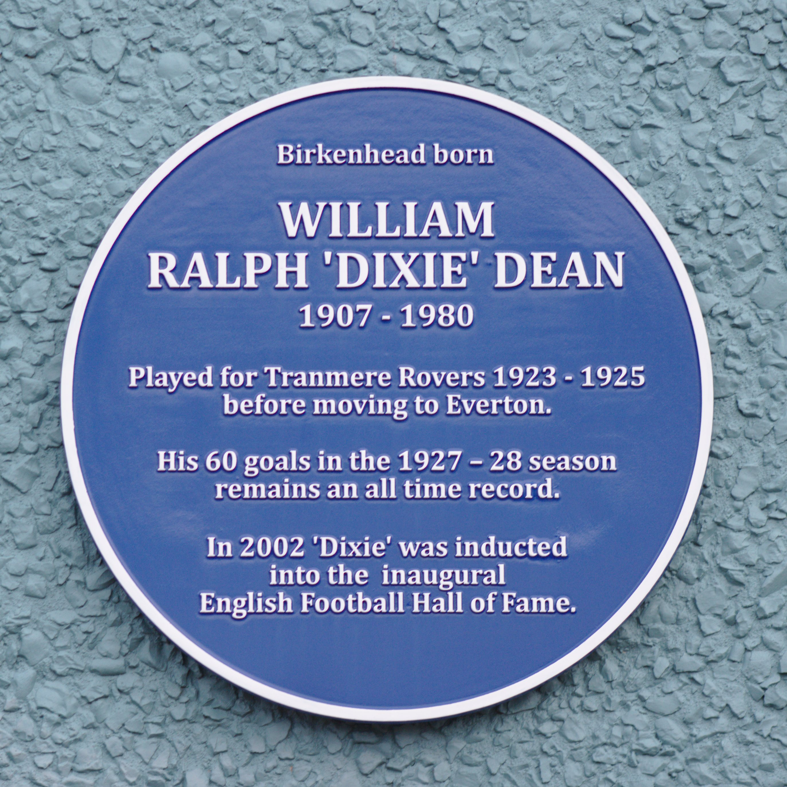 Plaque to legendary footballer Dixie Dean on the wall of the main stand at Prenton Park. Over the players' entrance.