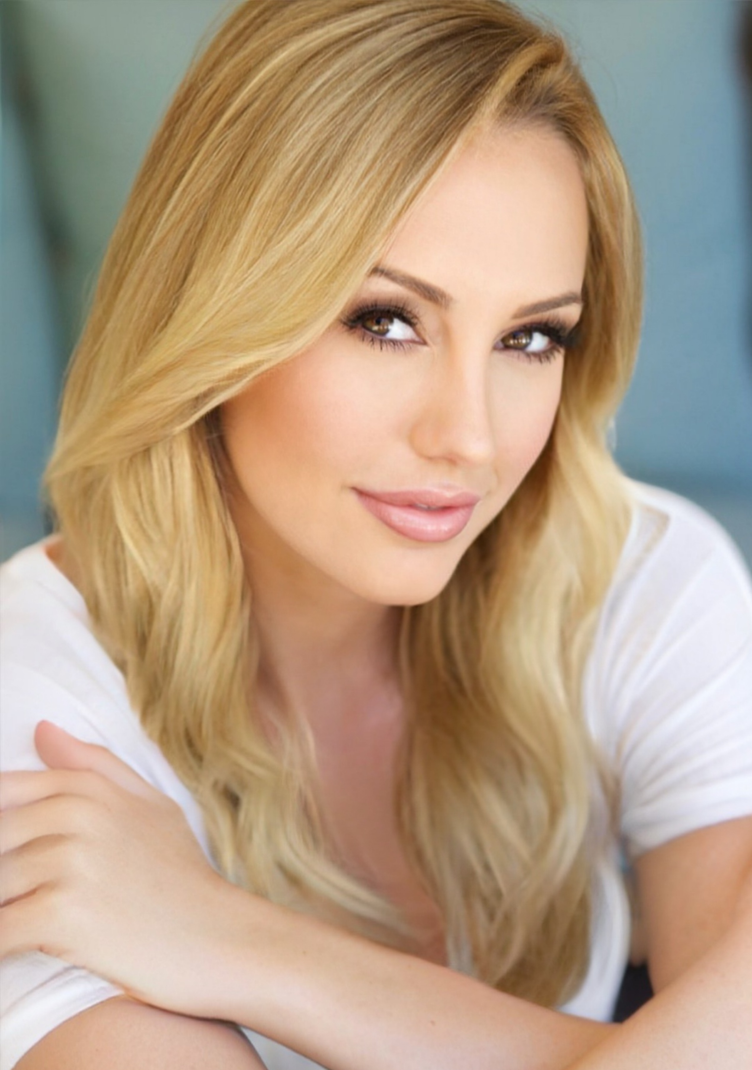 A recent headshot of Brett Rossi in 2025