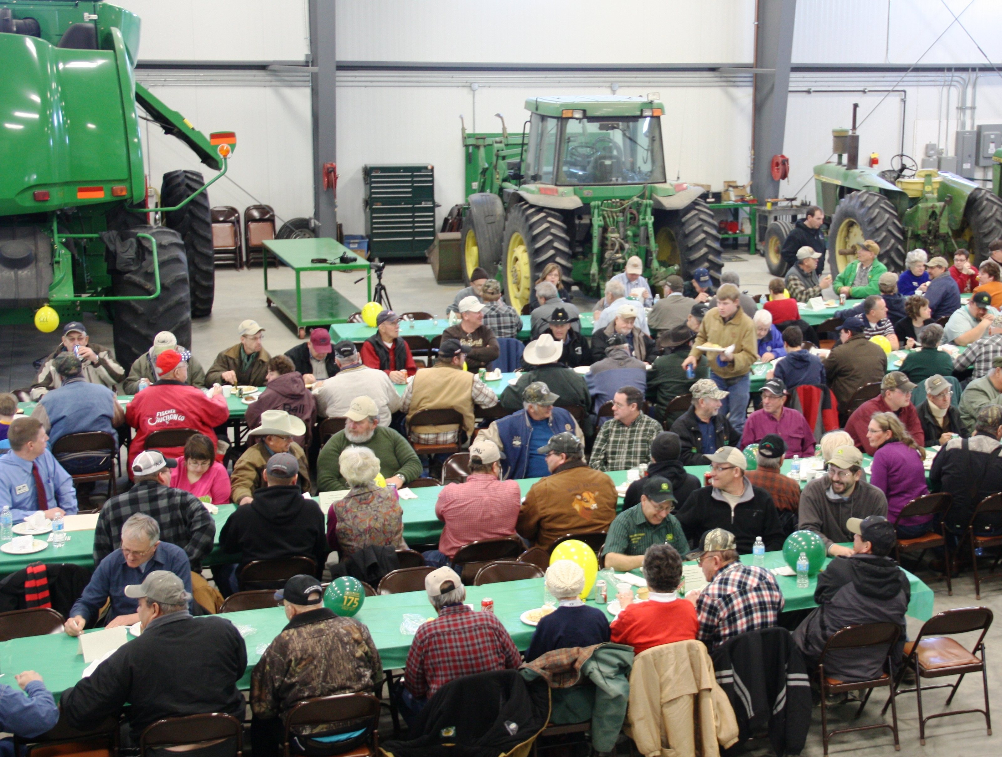 Over 250 people gathered to celebrate the Green Iron Equipment grand opening in Ashley, North Dakota.