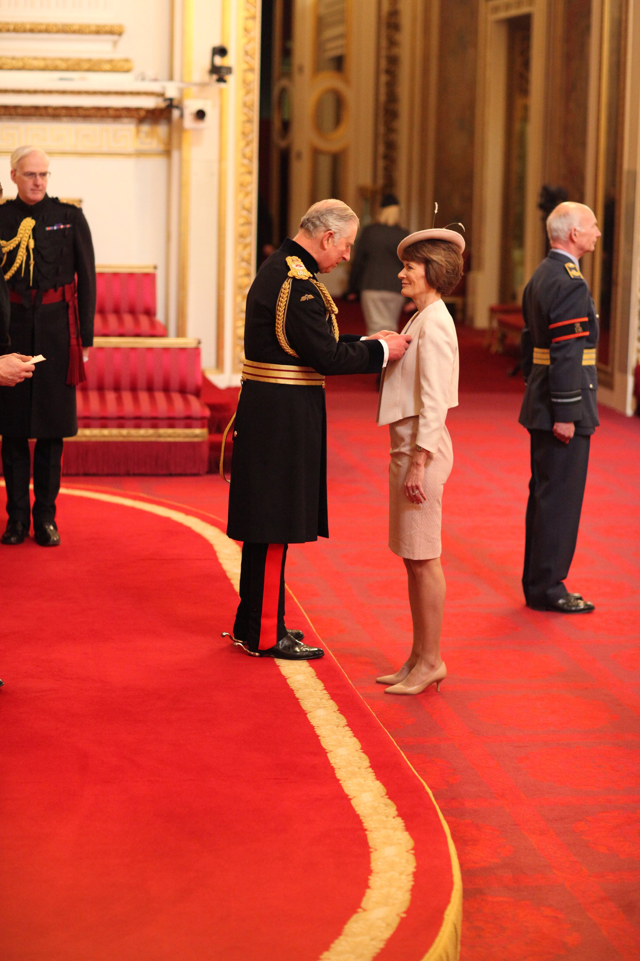 Hazel Moore receiving her OBE from HRH Prince Charles