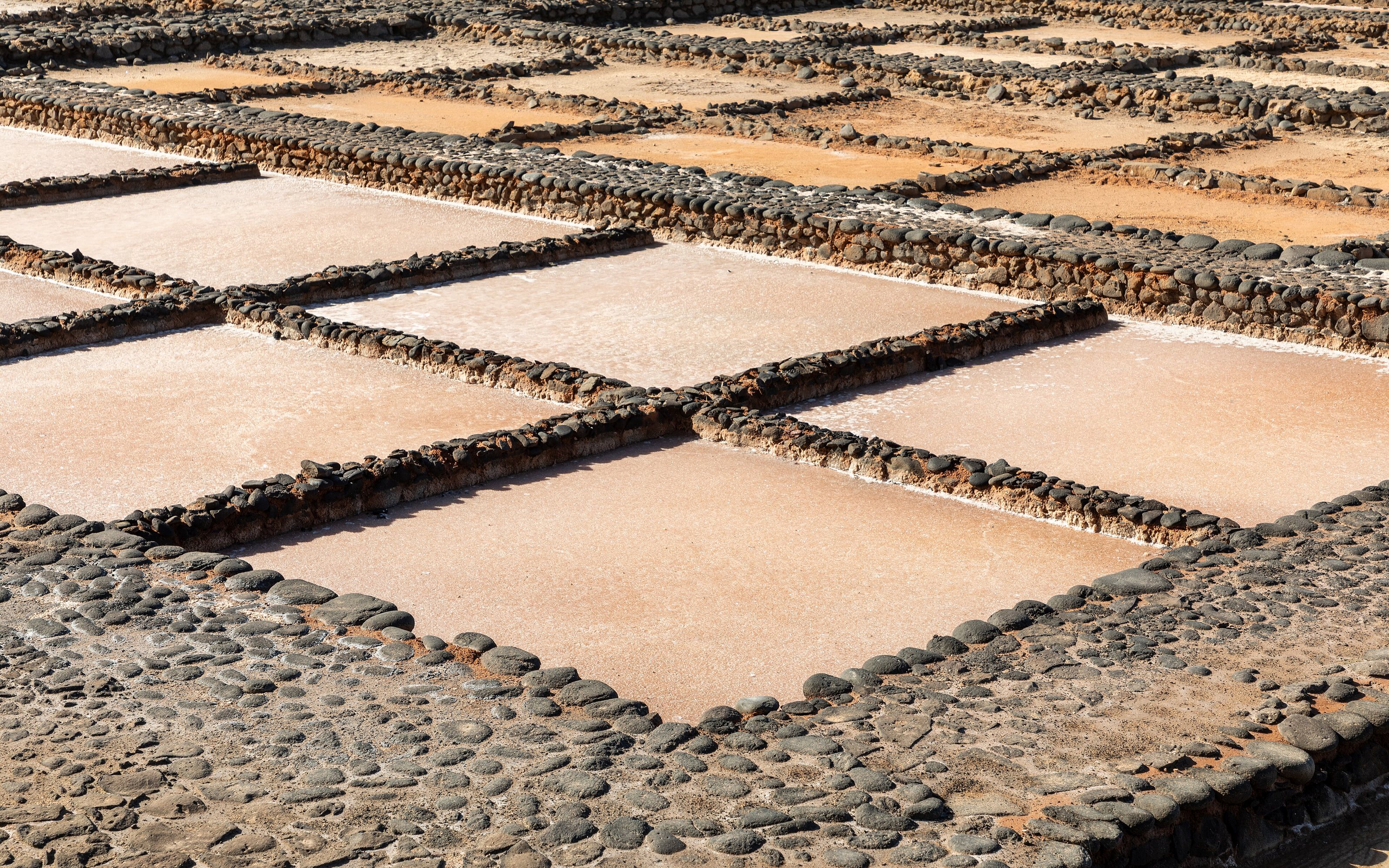 Crystallization basins in the museum “Las  Salinas del Carmen ”,  Antigua ,  Fuerteventura ,  Spain   The Museo de las Salinas del Carmen on Fuerteventura tells the story of traditional salt production. The saltworks the