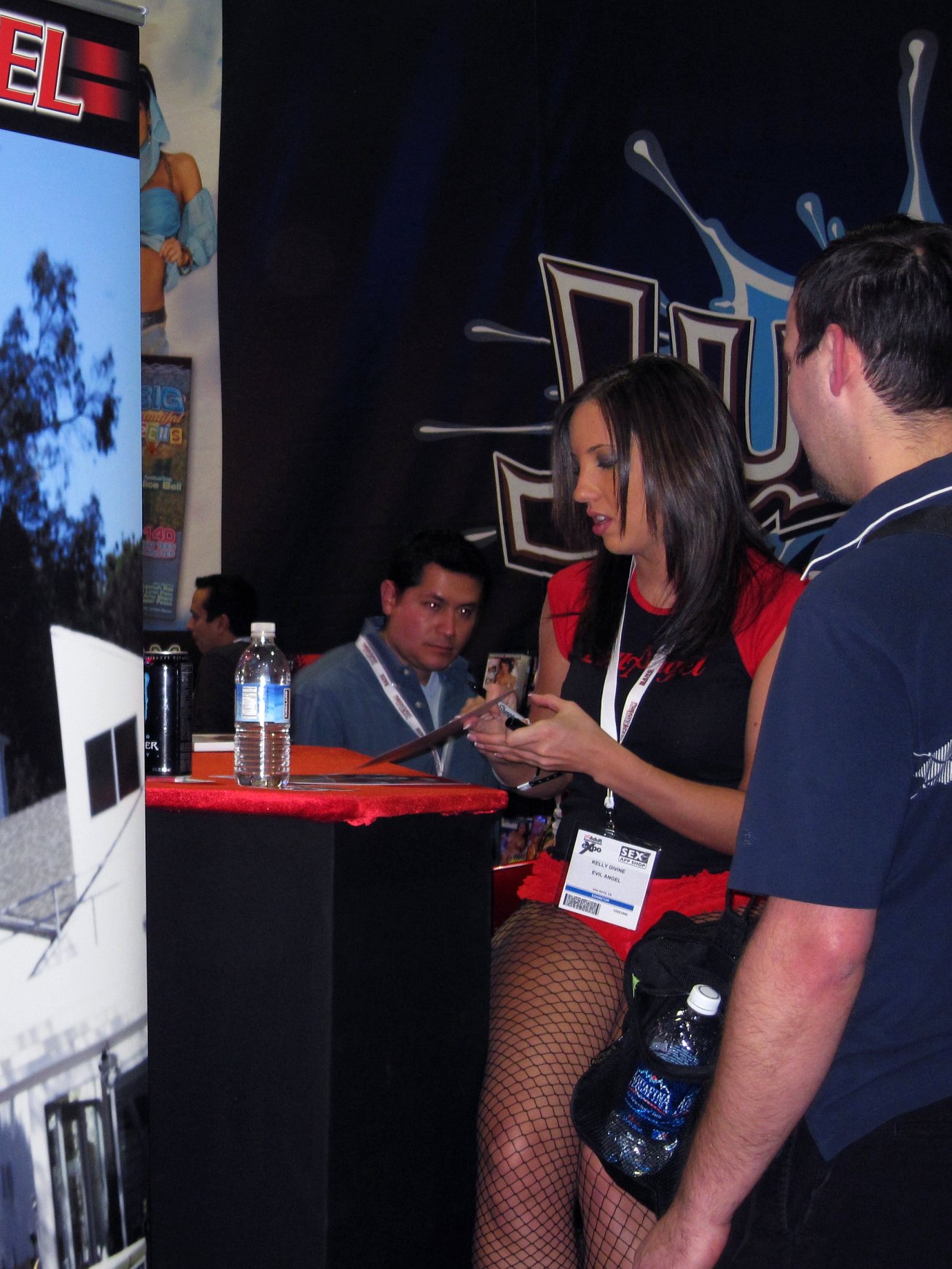 Porn Star Kelly Divine Signing at the Evil Angel Booth.