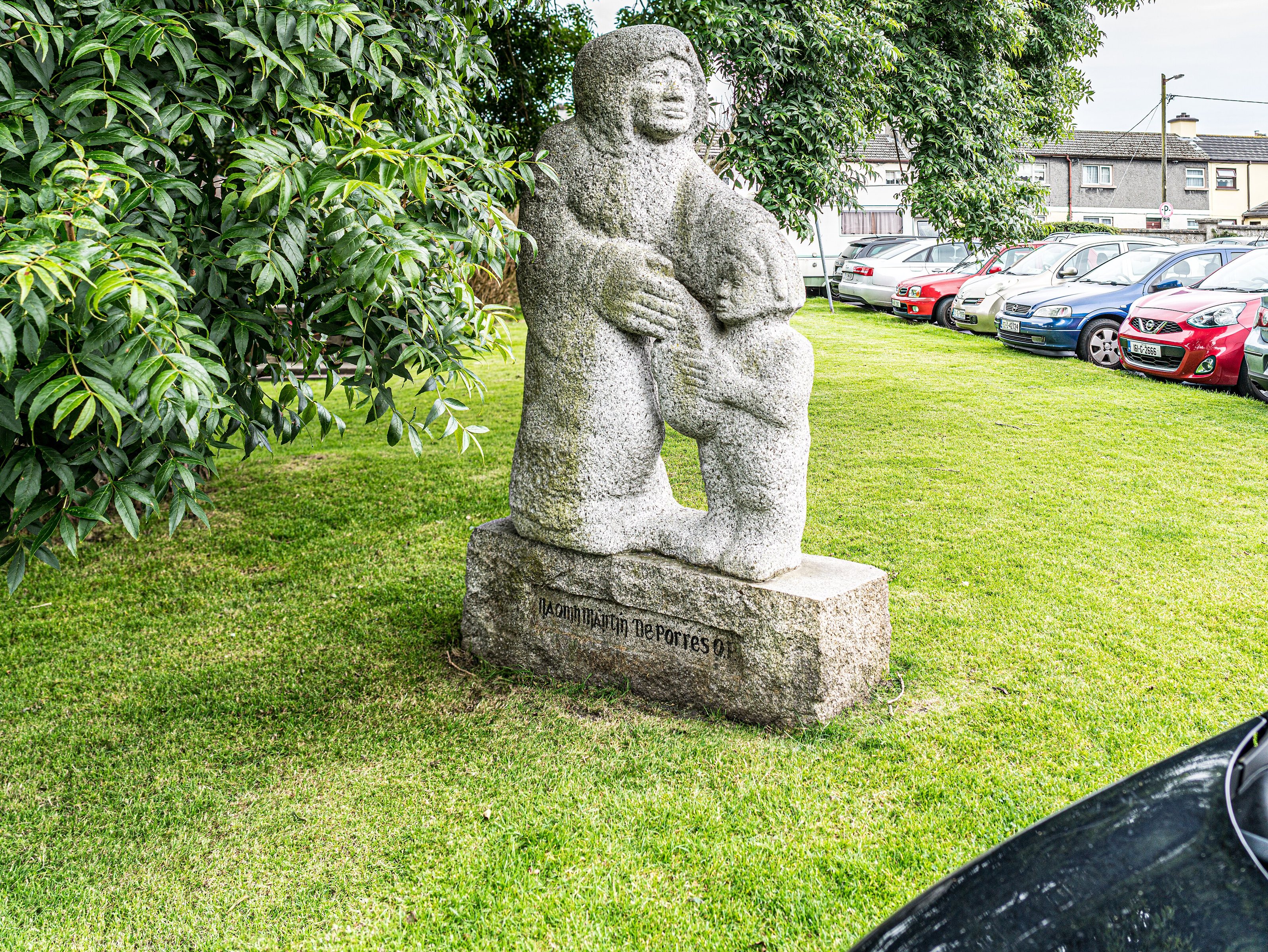 While I was attempting to photograph this a lady in a black car insisted on parking in such a manner as to block my view of this statue and she was very rude. I took the photograph in August 2015 but did not process it u