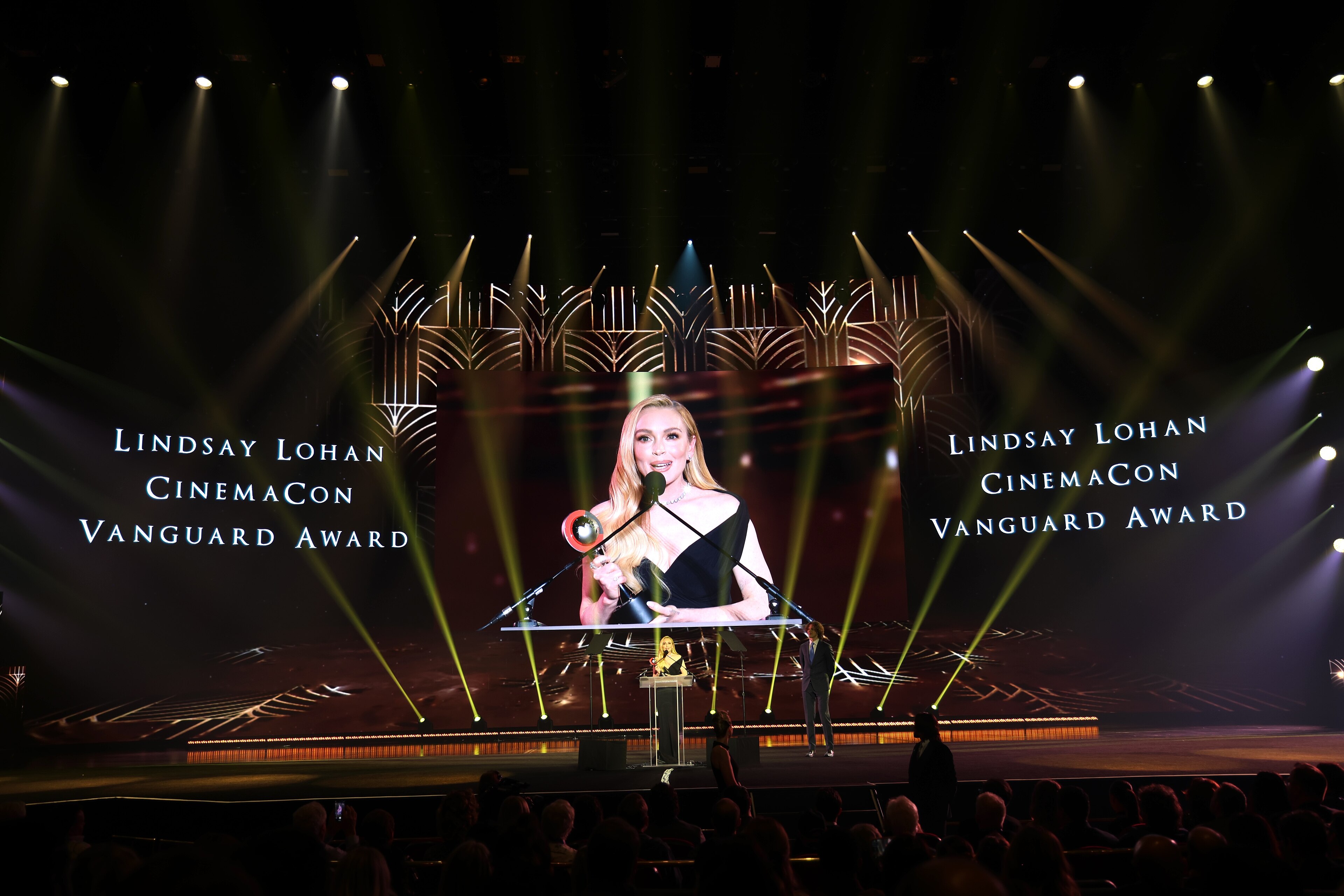 Lindsay Lohn accepting the Vanguard Award during the Big Screen Achievement Awards at CinemaCon 2025 in at Caesar's Palace at Las Vegas, NV