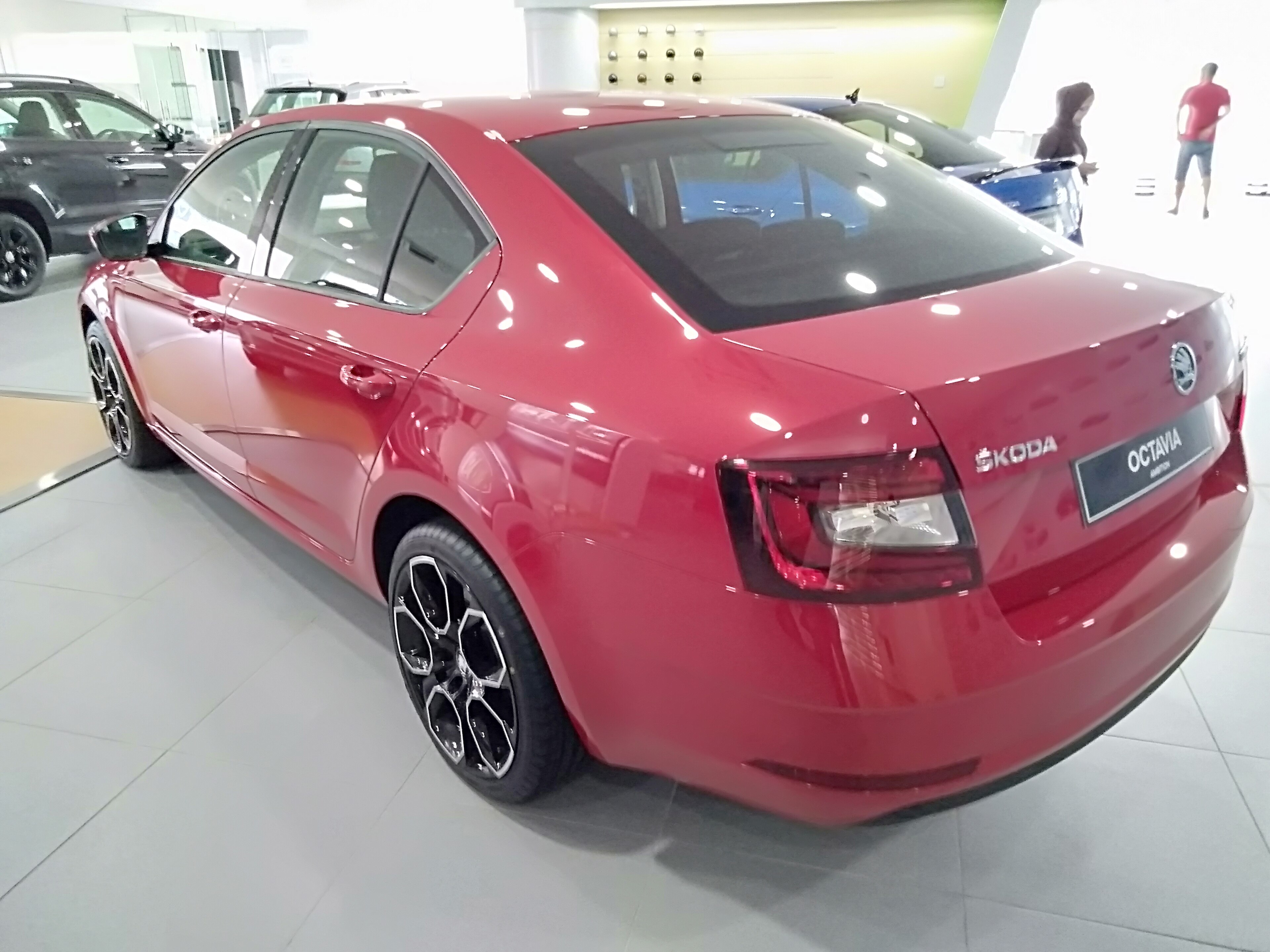 2021 SKODA Octavia 1.4 TSI Ambition rear view finished in red colour and RS rims. Photographed at Maju Motors Volkswagen and SKODA showroom, Telanai, Brunei.